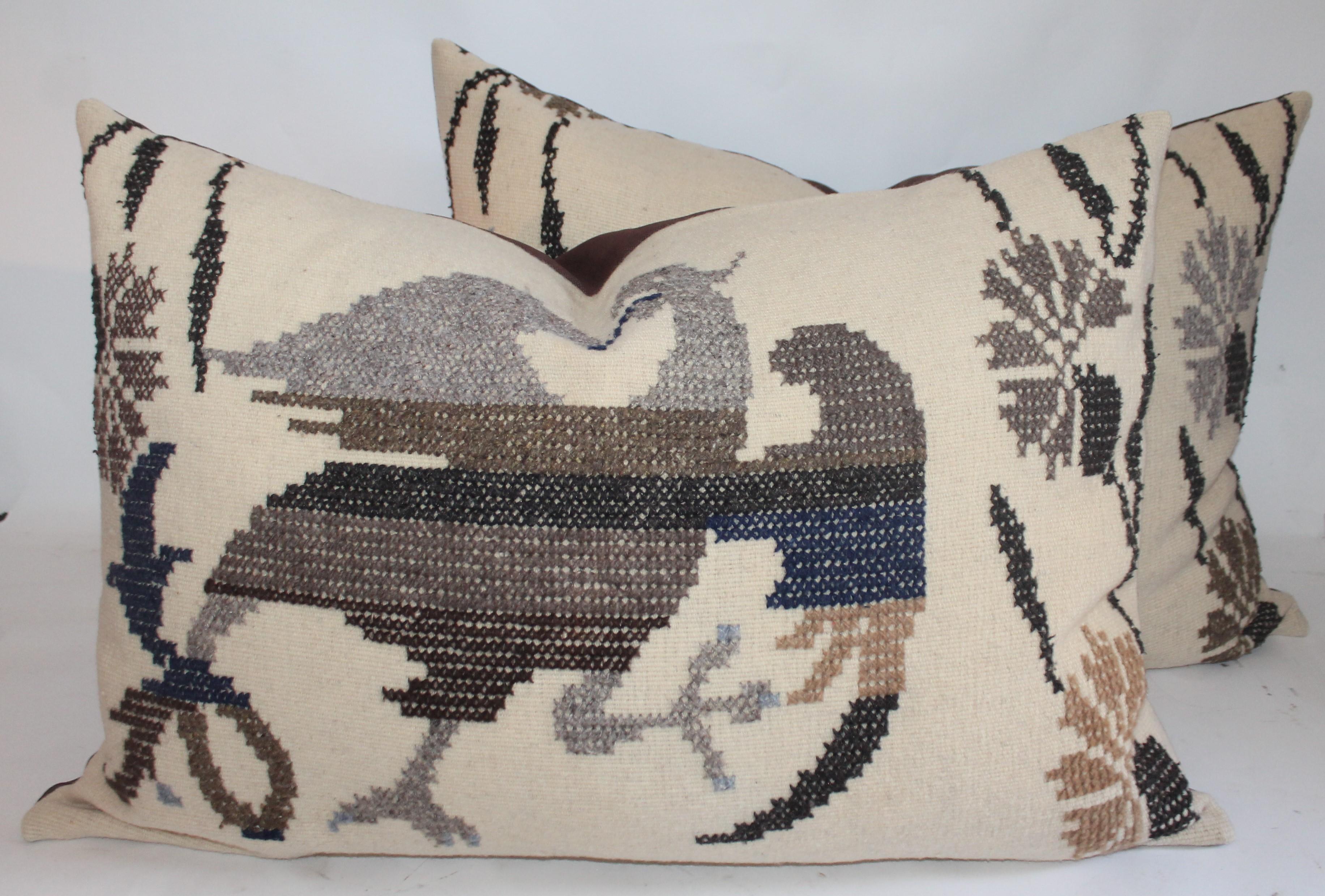 This early weaving has embroidered eagle on linen. There are two pillows matching but sold individually. They can be sold as a matching pair for 1495. For the pair.
