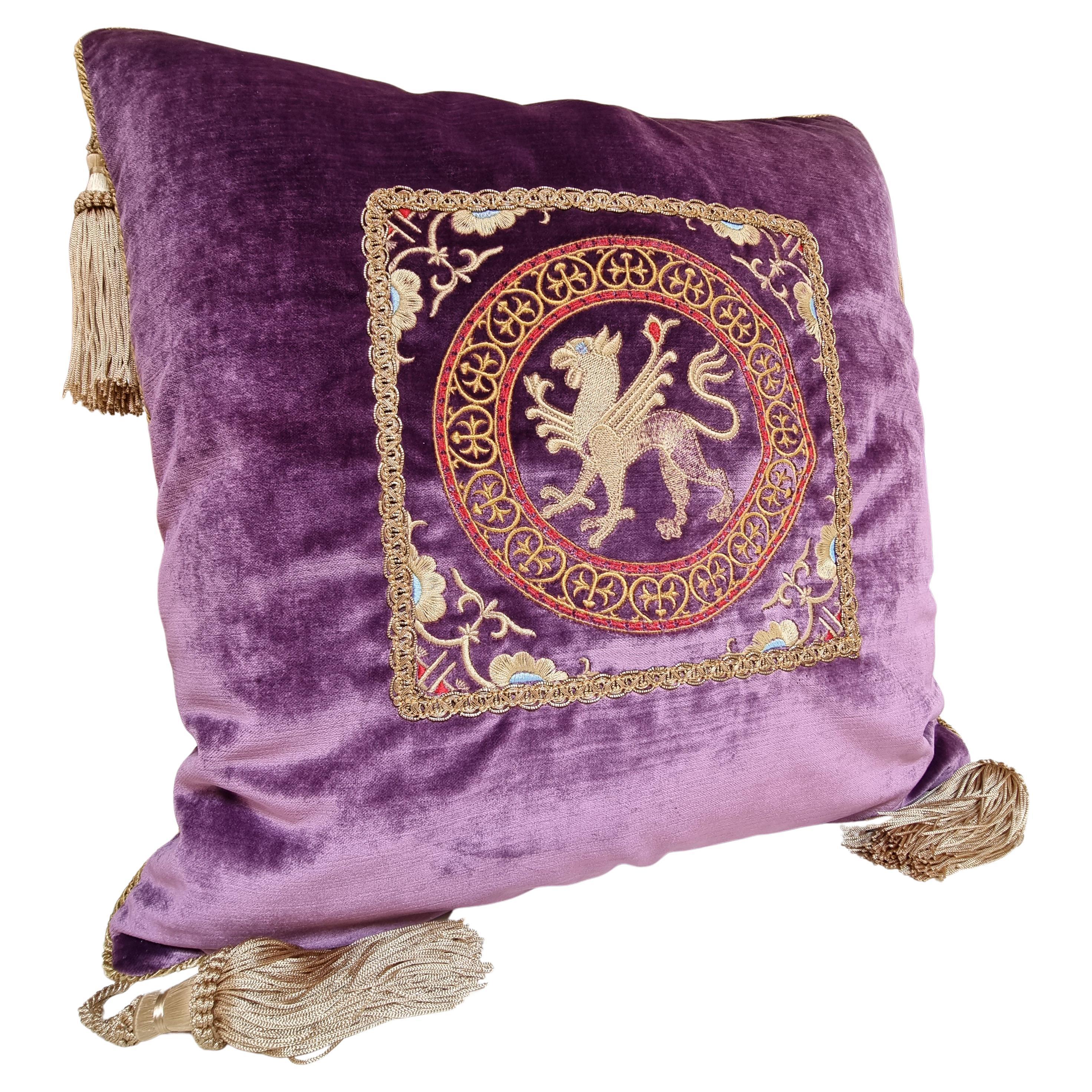 This amazing decorative pillow with beige tassel at the four corners is handmade using Rubelli  velvet in purple color on both sides finished with Houlès  twisted lip cord, embellished with precious embroideries (13th-century design) framed with