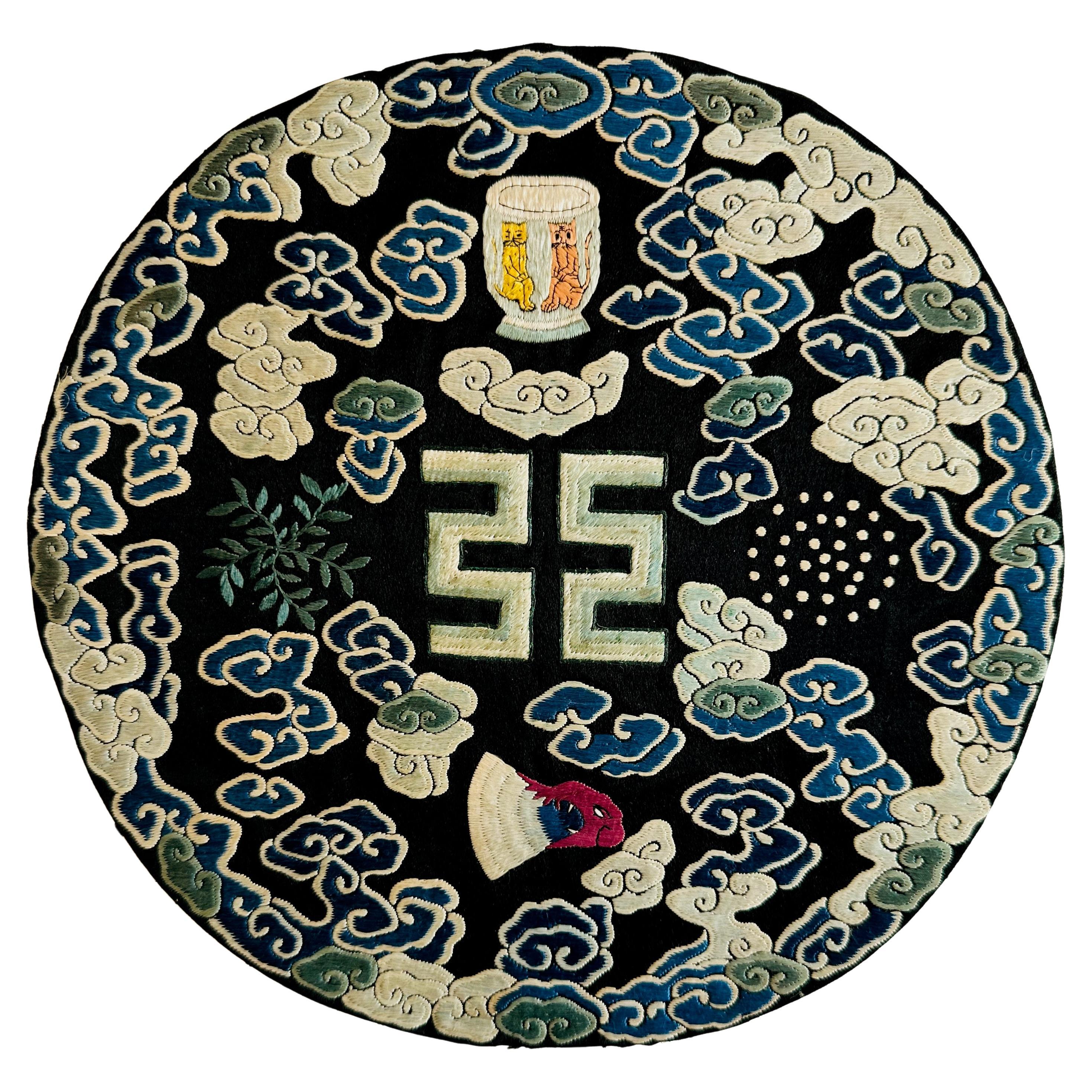 Embroidered roundel with Buddhist symbols, Qing Dynasty For Sale