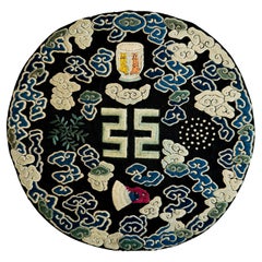 Antique Embroidered roundel with Buddhist symbols, Qing Dynasty