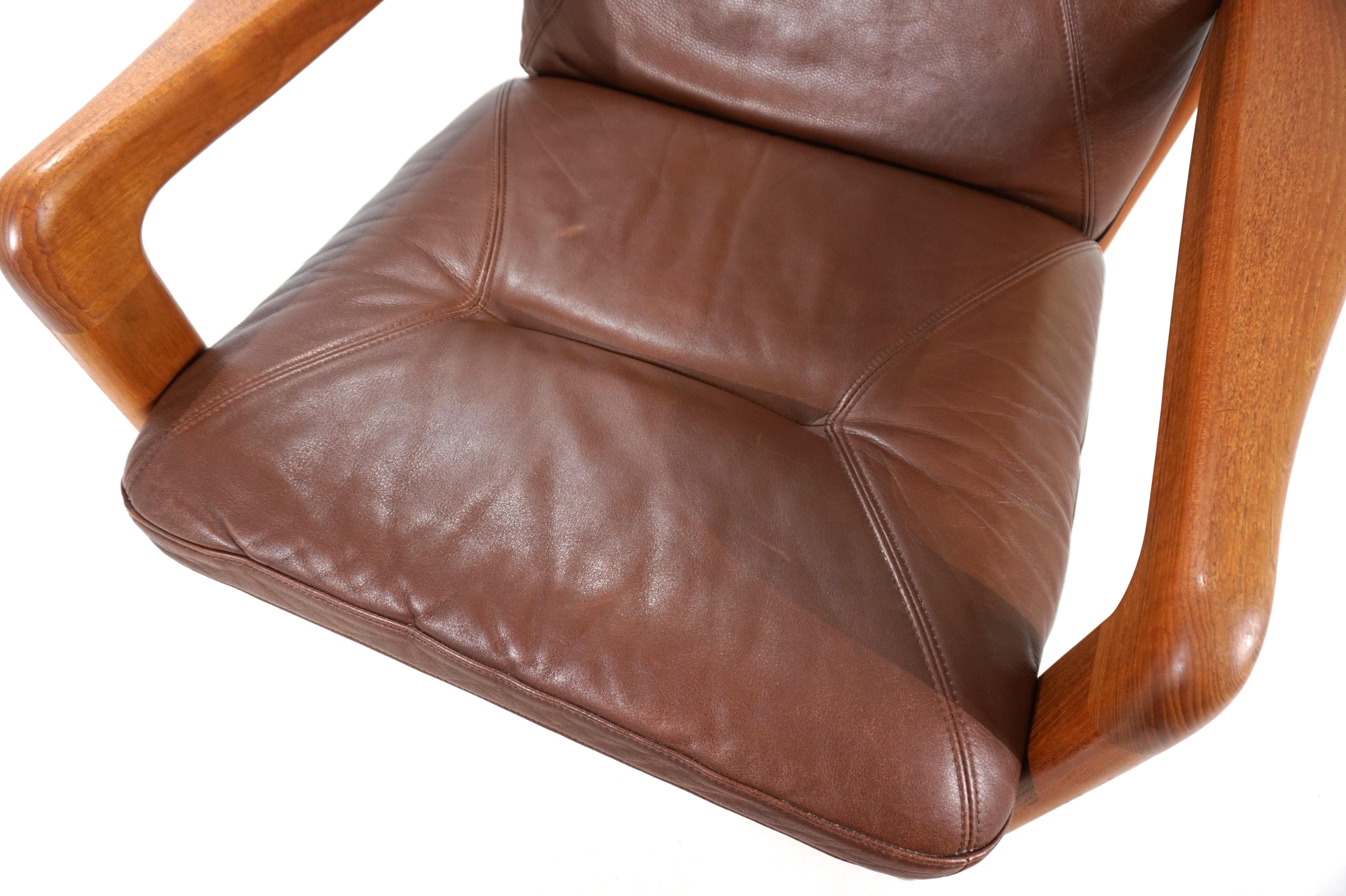 Leather EMC teak leather armchair, 1960 For Sale