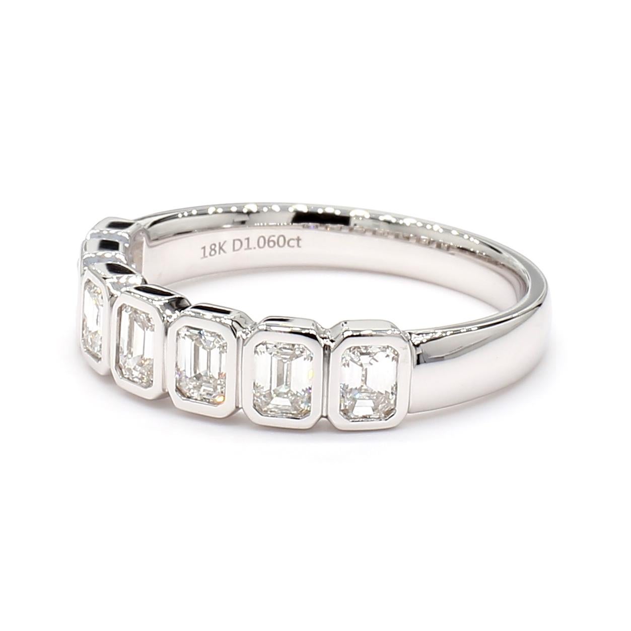 This Eternity halfway Emerald Cut Bezel Set Diamond Ring is a testament to fine craftsmanship and timeless design. Perfect for those who appreciate the beauty of natural diamonds, this ring offers a balance of luxury and tasteful