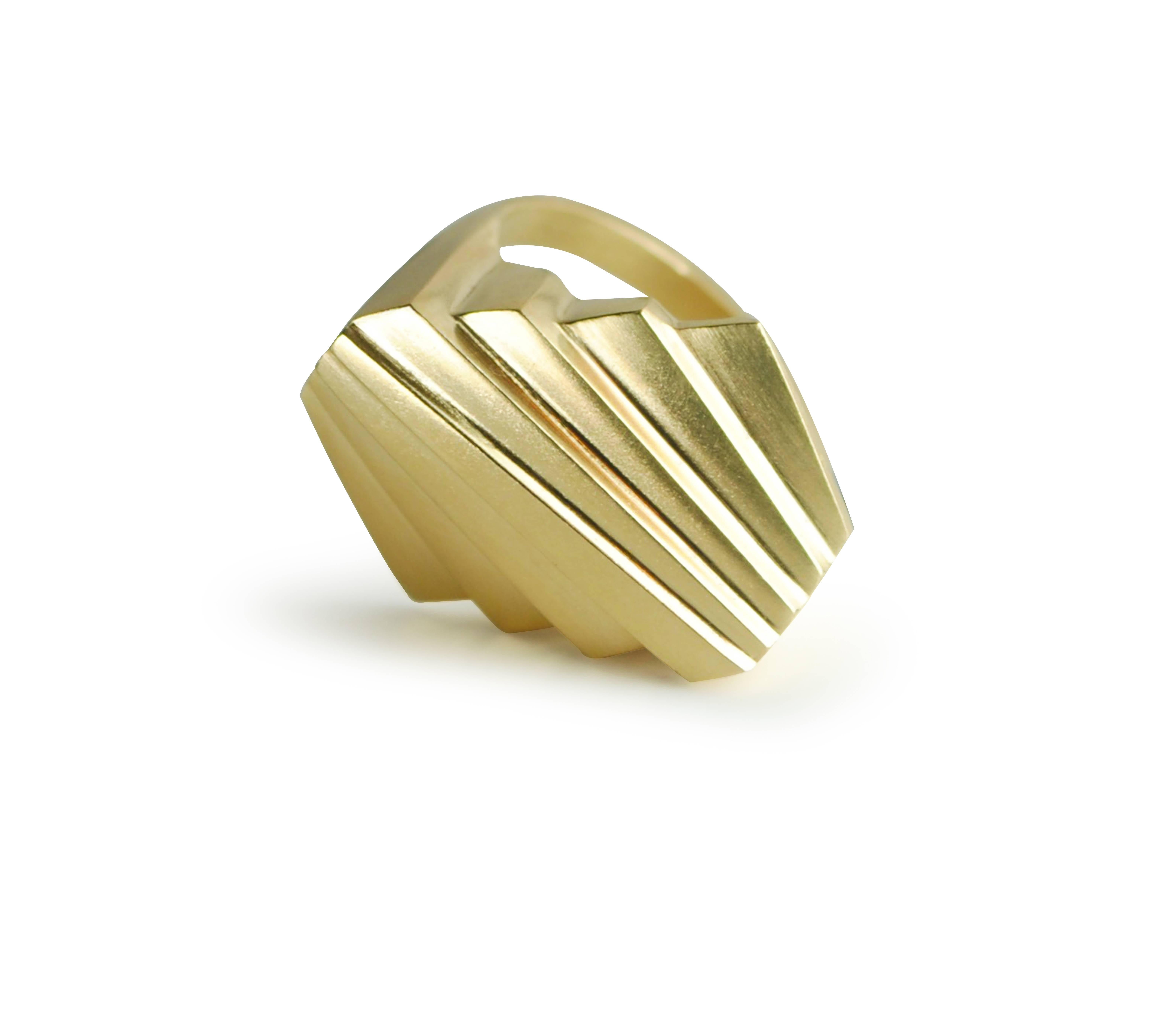 The 18 Karat Gold Twin Deco ring is a beautiful yet subtle statement piece. Catching light, the Art Deco steps fan approach  echoes classy influence with quiet elegance in gold.

Designed and created in Dublin, Ireland.