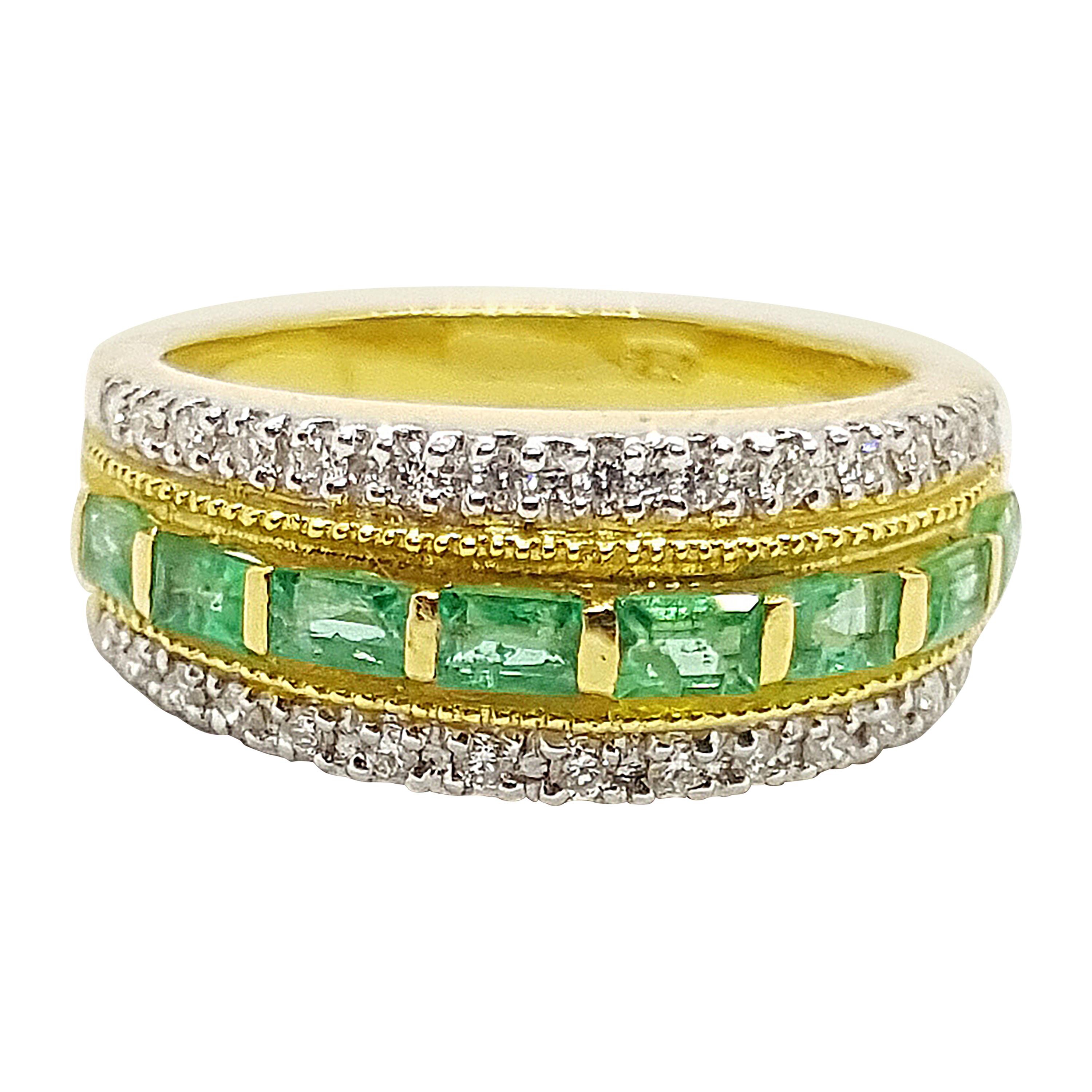 Emerald 0.68 Carat with Diamond 0.26 Carat Ring Set in 18 Karat Gold Settings
