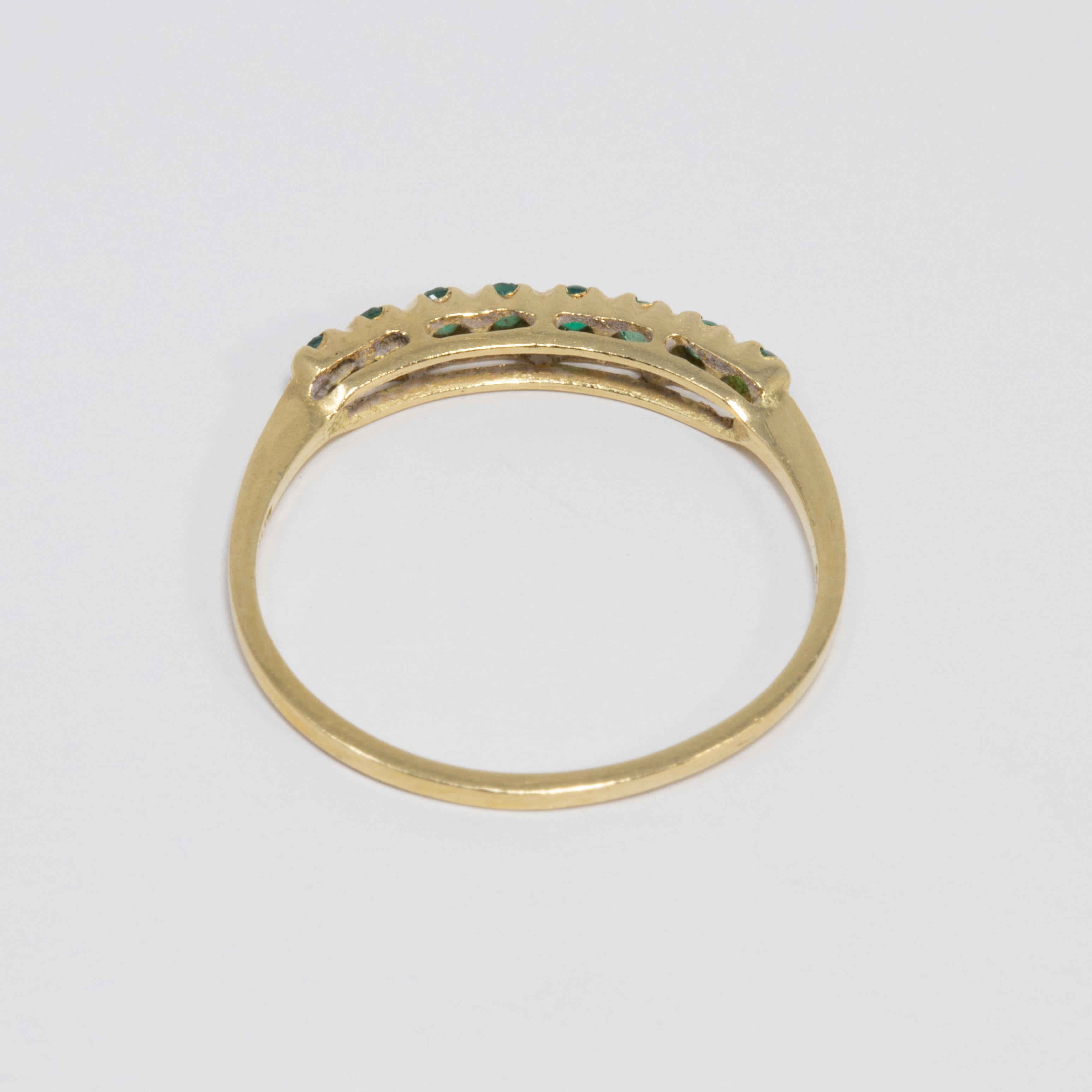 Women's or Men's Emerald 14 Karat Yellow Gold Ring, Anniversary Band, .1 Carat Prong Set For Sale