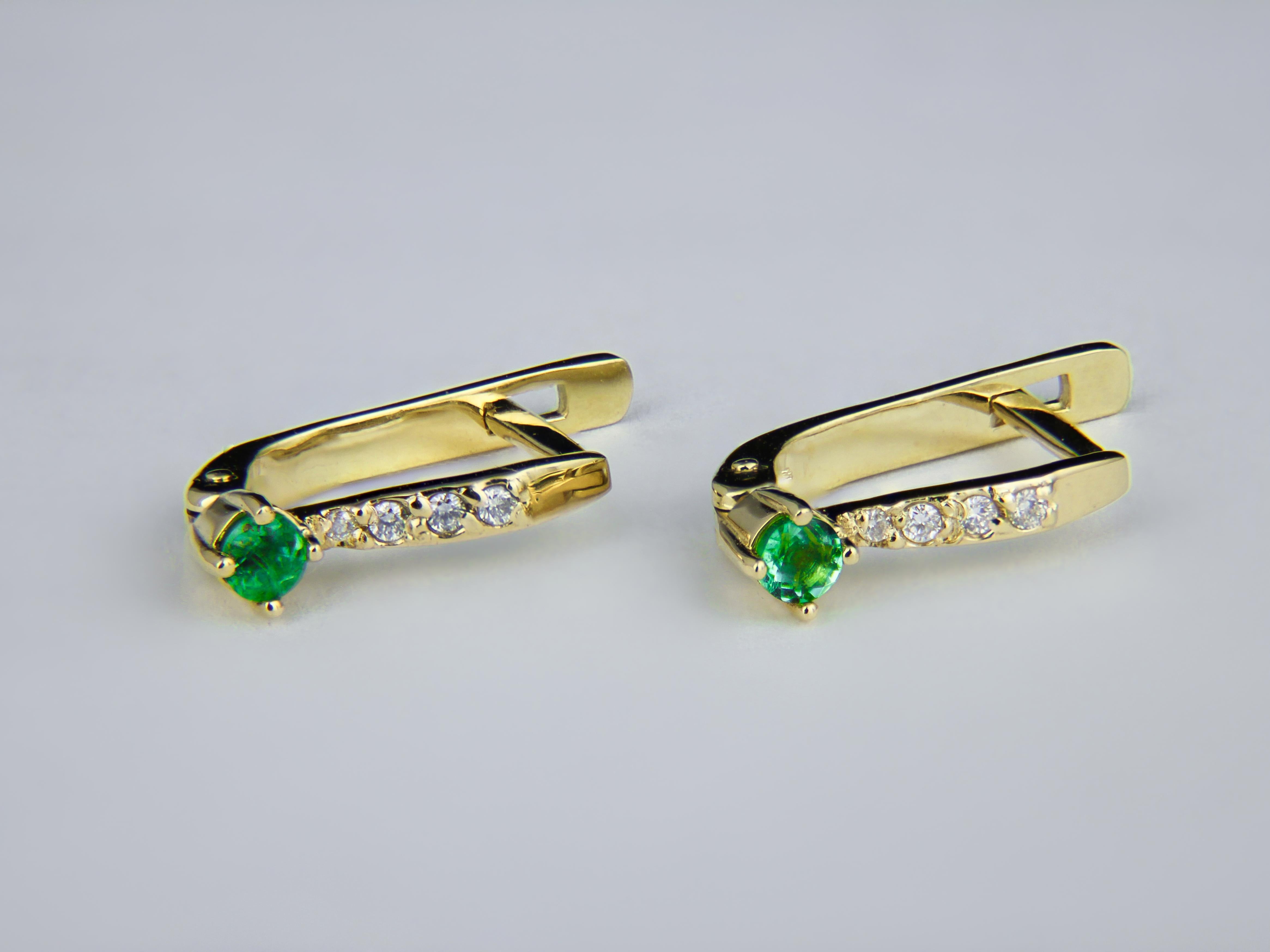 Emerald gold earrings. Tiny emerald earrings. Gold earrings for girl. Delicate emerald earrings. 14k Gold Earrings With Emeralds, Diamonds.  Young girl gold earrings with emeralds.

Total weight: 2 g. 
Gold -14k gold
Size: 16.4 x 3.65 mm. 
Central