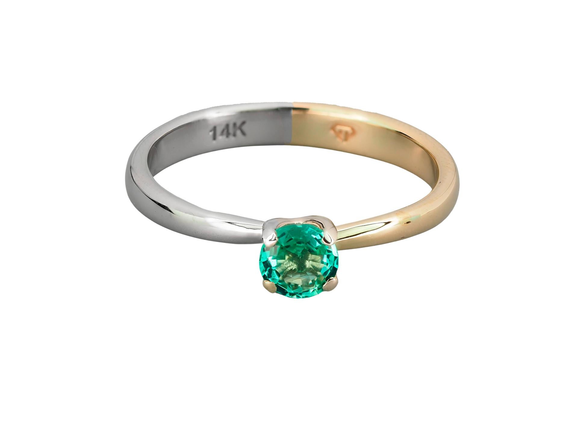 Emerald 14k gold ring. 
Round emerald ring. Two color gold ring. White and yellow gold ring. Dainty Emerald engagement ring. May Birthstone.

Metal: 14k yellow and white gold
Weight - 2.6 g. depends from size.

Central stone: emerald
Cut: