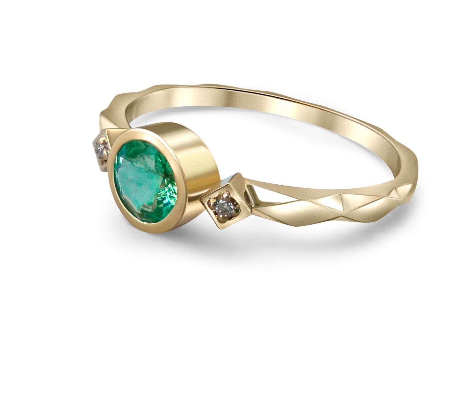 Emerald 14k gold ring. 
Minimalist emerald ring. Real emerald ring. Stackable emerald ring. Round Emerald ring. 3 gemstone ring.

Metal: 14 karat gold.
Weight: 1.4 gr (depends from size).

Gemstones:
Emerald: round cut, green color, transparent with