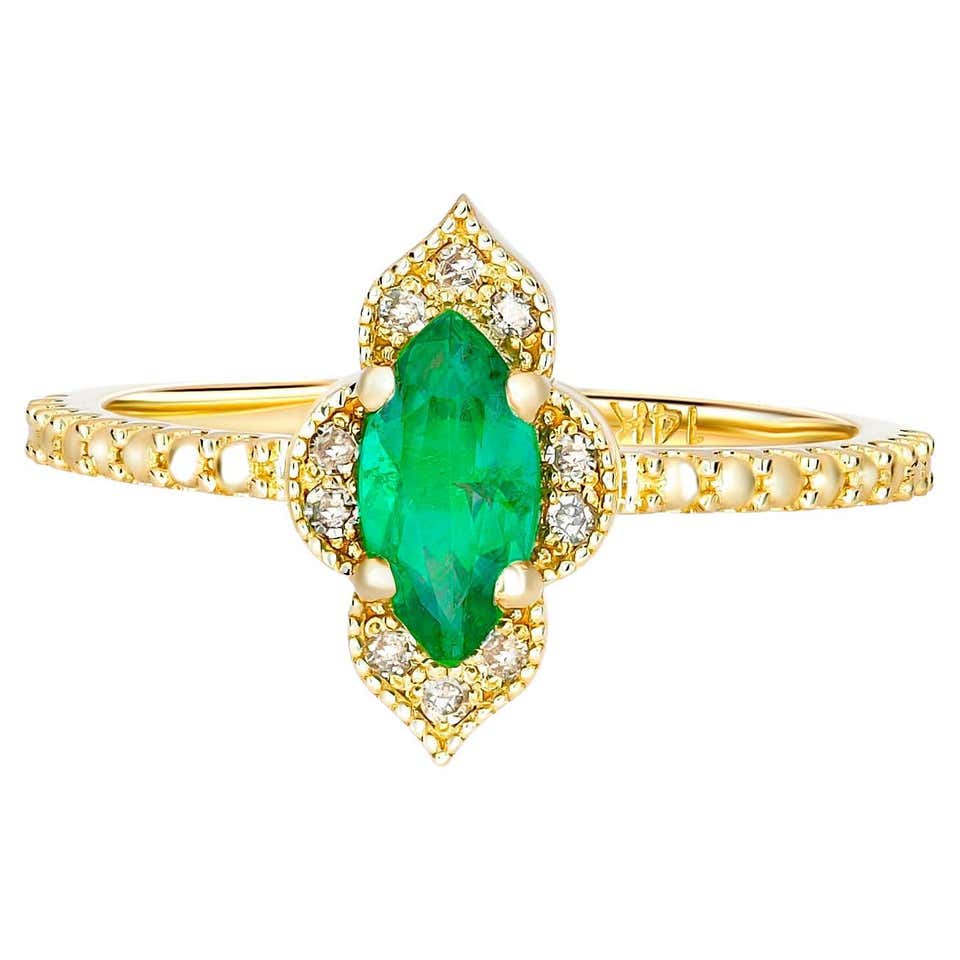 Authentic Emerald Rings Delicate Emerald ring in 14k gold. For Sale at 1stDibs