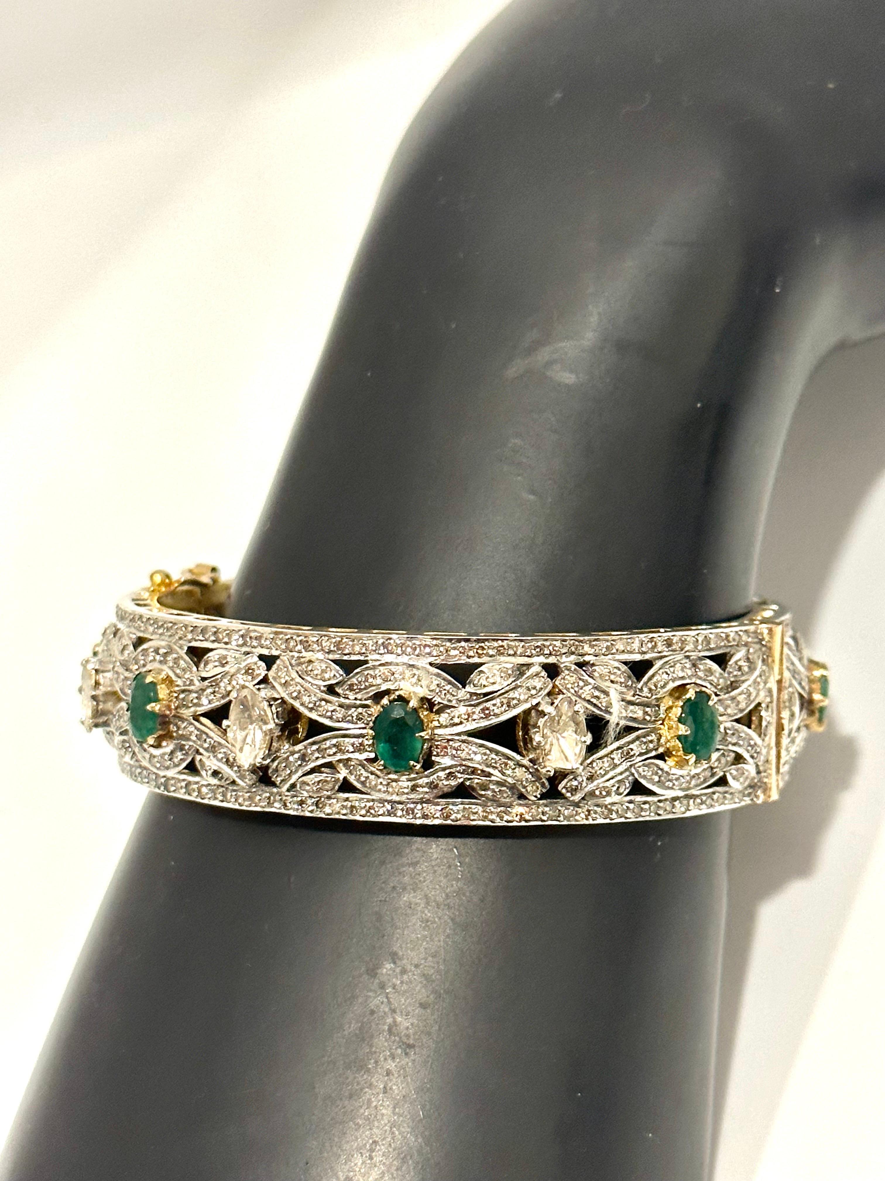 18 Karat Yellow gold & 925 Silver Polki Bangle, Solid Silver &  Gold  Diamond Bangle, Victorian Diamond Handmade Bracelets
It features a bangle style  crafted from an 18k Yellow gold and  Sterling Silver embedded with many  big  polki  diamonds and