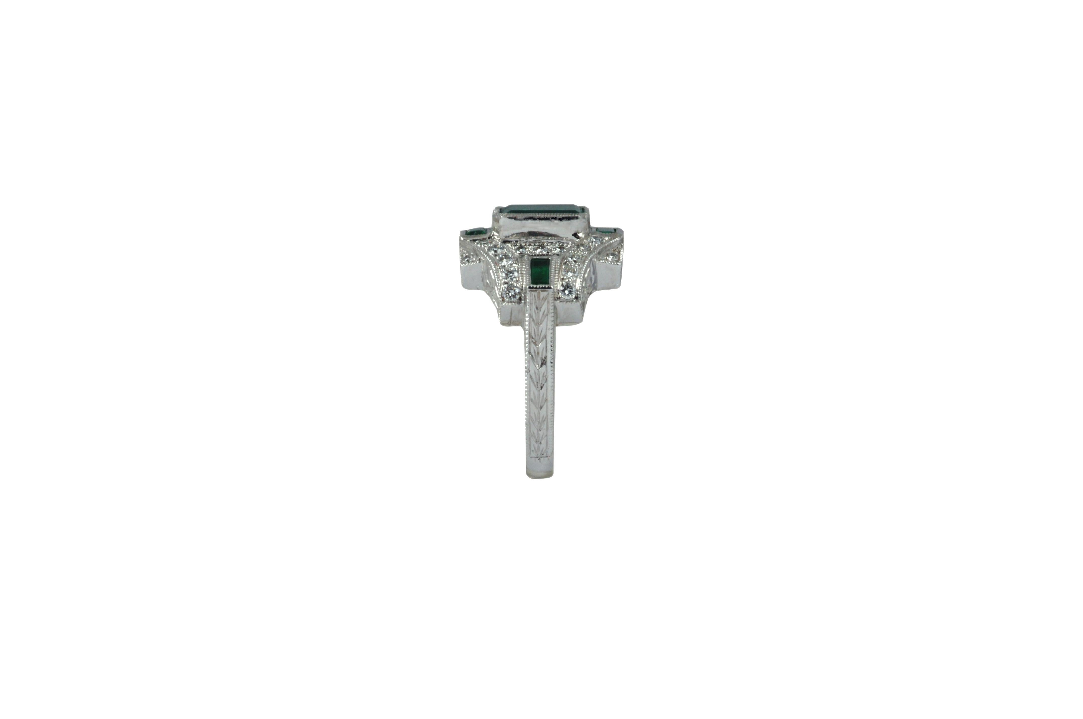 Emerald Cut Emerald 1.66 Carat, Emerald 0.33 Carat, Diamond 0.37 Carat Ring in 18 Karat Gold For Sale