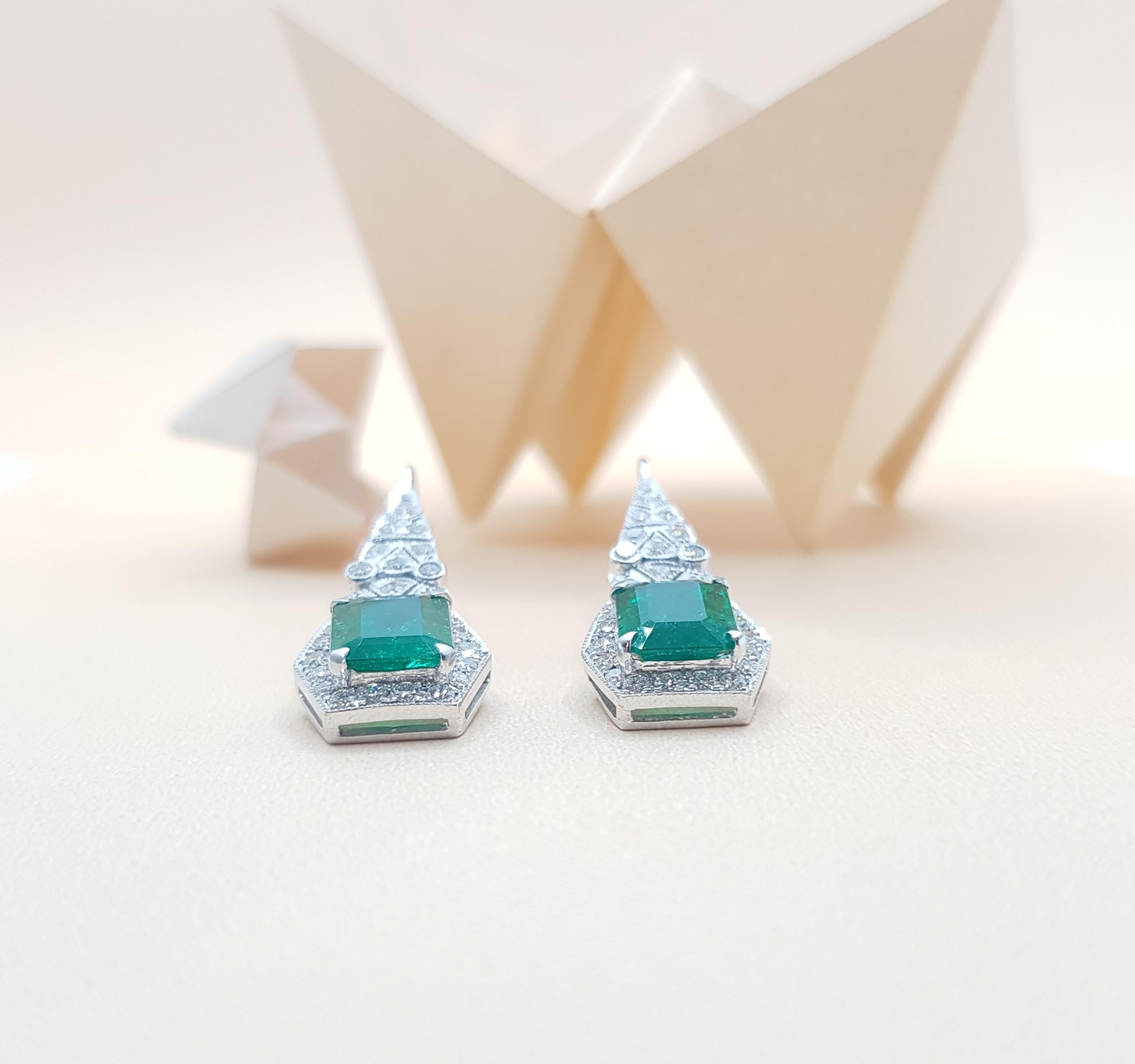 Emerald 3.42 Carat with Diamond 0.88 Carat Earrings Set in 18 Karat White Gold 1