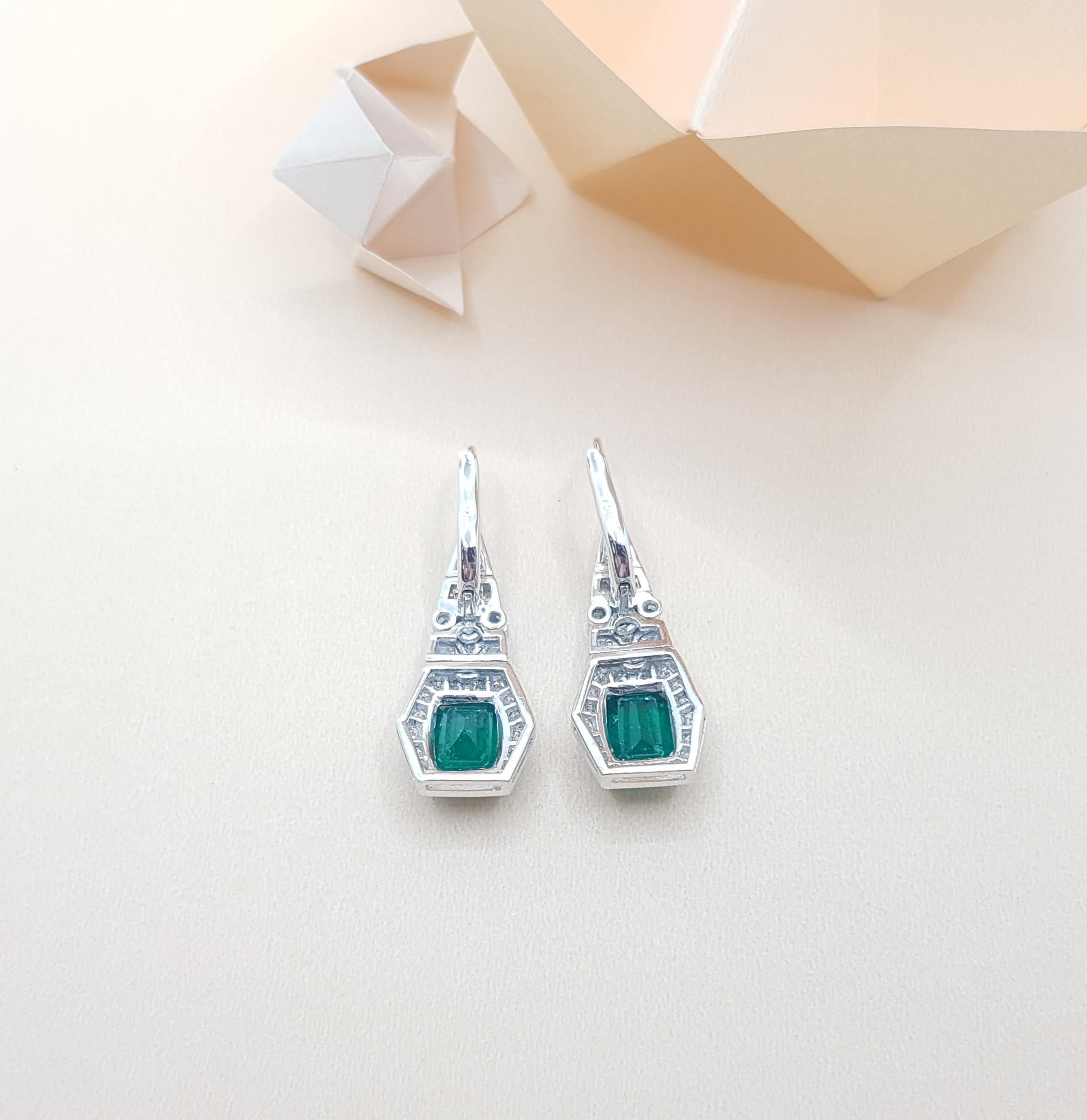 Emerald 3.42 Carat with Diamond 0.88 Carat Earrings Set in 18 Karat White Gold 3