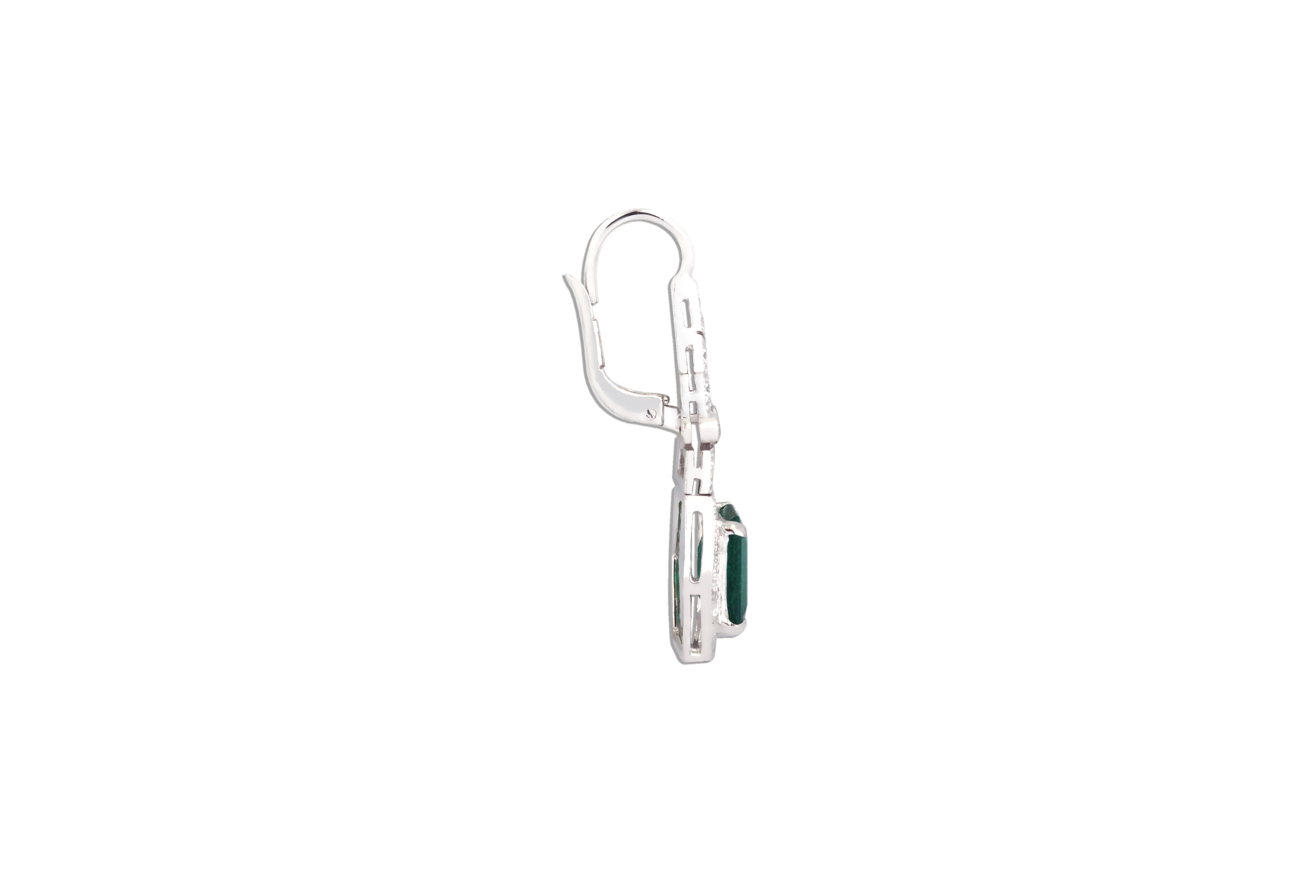 Emerald 3.42 carats with Diamond 0.88 carat  Earrings set in 18 Karat White Gold Settings

Width: 1.0 cm
Length: 3.4 cm

