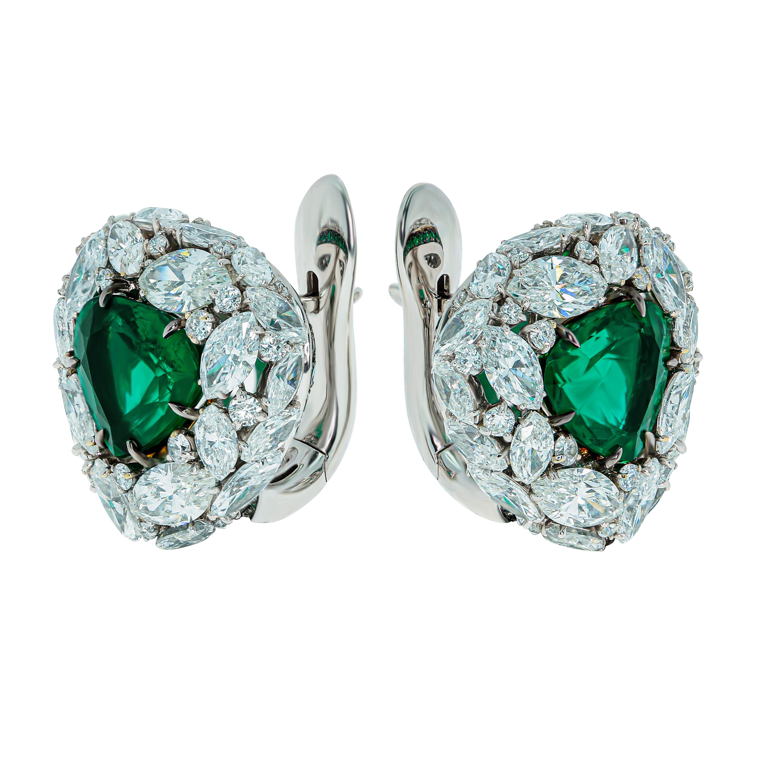 Emerald 4.05 Carat Diamonds Emeralds 18 Karat White Gold Earrings

What could be more elegant than a combination of cold 18 Karat White Gold, Diamonds and a bright spot of color in the form of an Emerald? Right, nothing. 44 Marquise-shape Diamonds