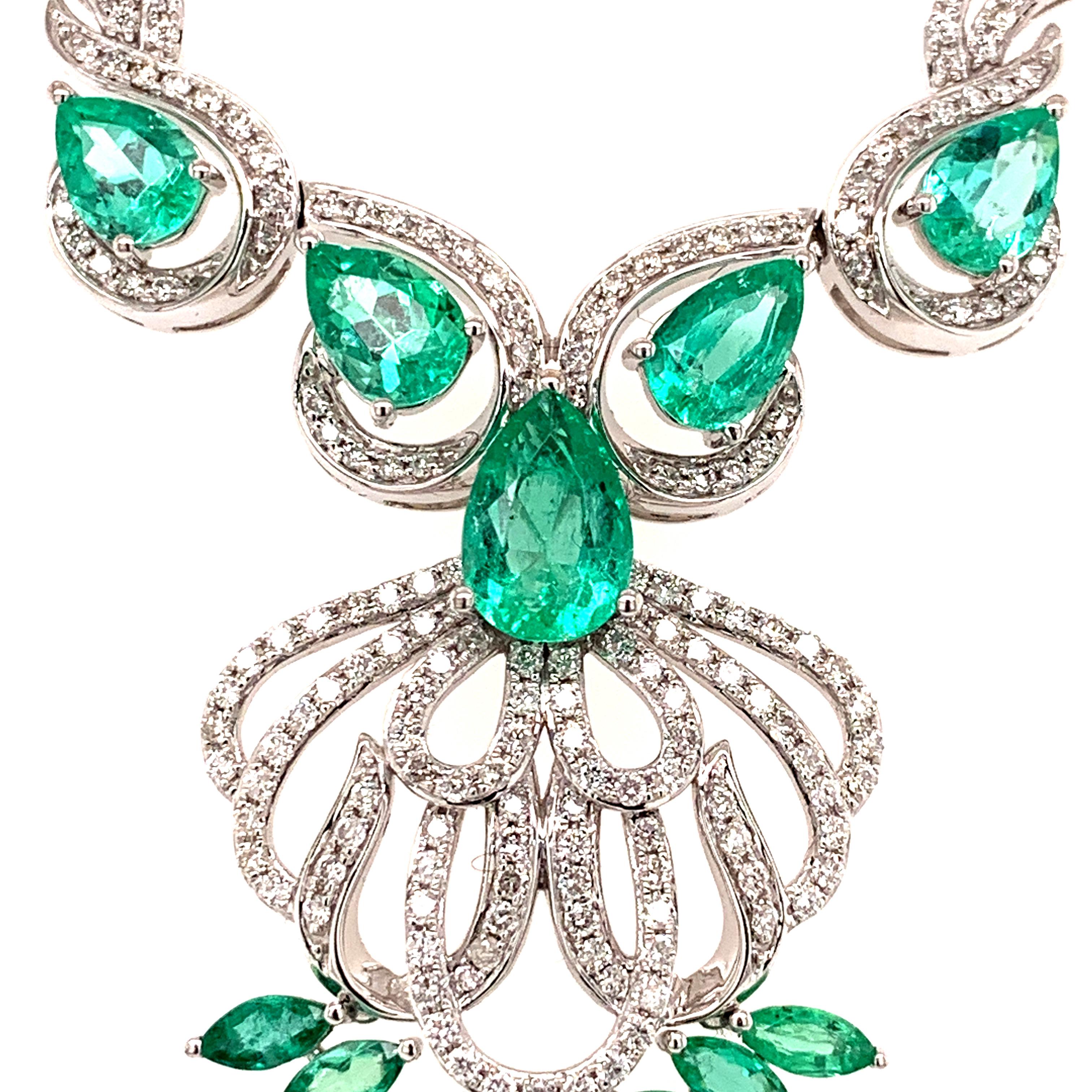 Elegant emerald diamond necklace. Lively green, high luster, pear, marquise faceted, 5.17 carats emeralds mounted in high profile open basket, accented with round brilliant cut diamonds. Handcrafted design set in high polished 14 karat white gold