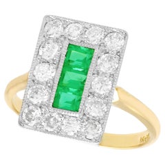 Vintage Emerald and 1.33 Carat Diamond Yellow Gold Cocktail Ring