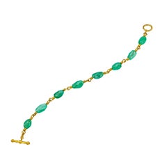 Emerald and 22 Karat Gold Bracelet