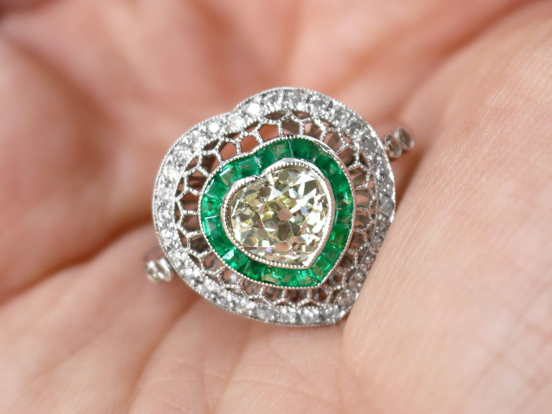 A stunning antique and contemporary 0.68 carat emerald and 2.62 carat diamond, platinum cocktail ring; part of our diverse emerald jewellery and estate jewelry collections.

This stunning, fine and impressive emerald and diamond ring has been