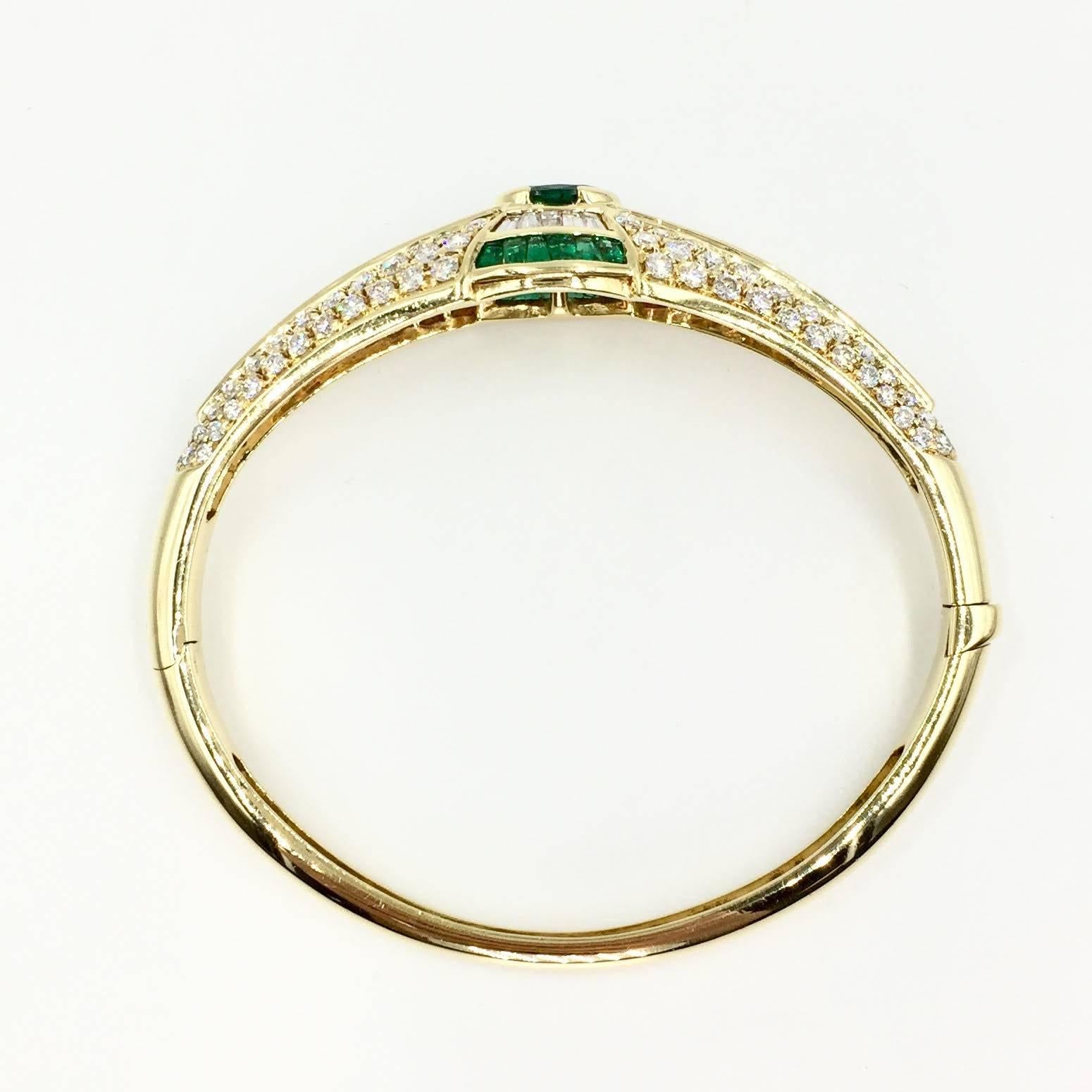 Oval Cut Emerald and Approximate 3.50 Carat Diamond 18 Karat Yellow Gold Bangle Bracelet