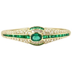 Emerald and Approximate 3.50 Carat Diamond 18 Karat Yellow Gold Bangle Bracelet