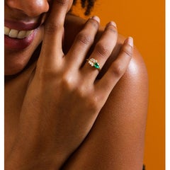 Emerald And Baguette 0.77ct Diamond Ring