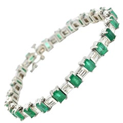 Emerald and Baguette Cut Diamond Tennis Bracelet 14 Karat White Gold