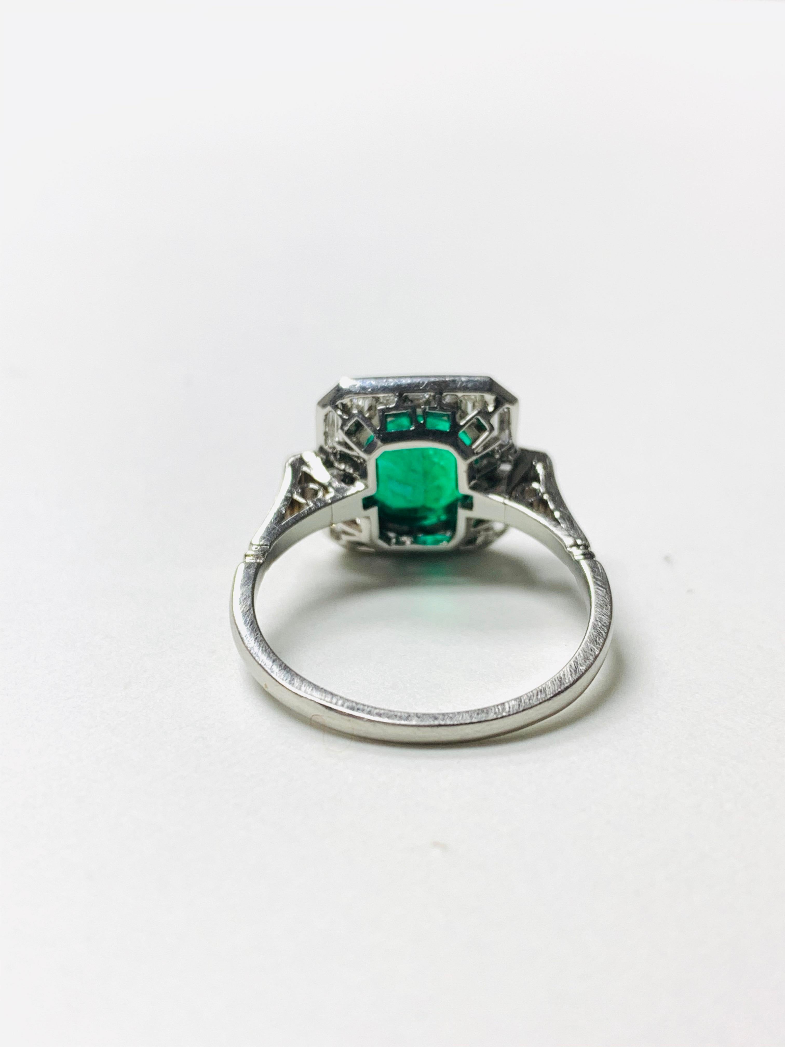 Emerald and Baguette Diamond Engagement Ring in Platinum In New Condition In New York, NY