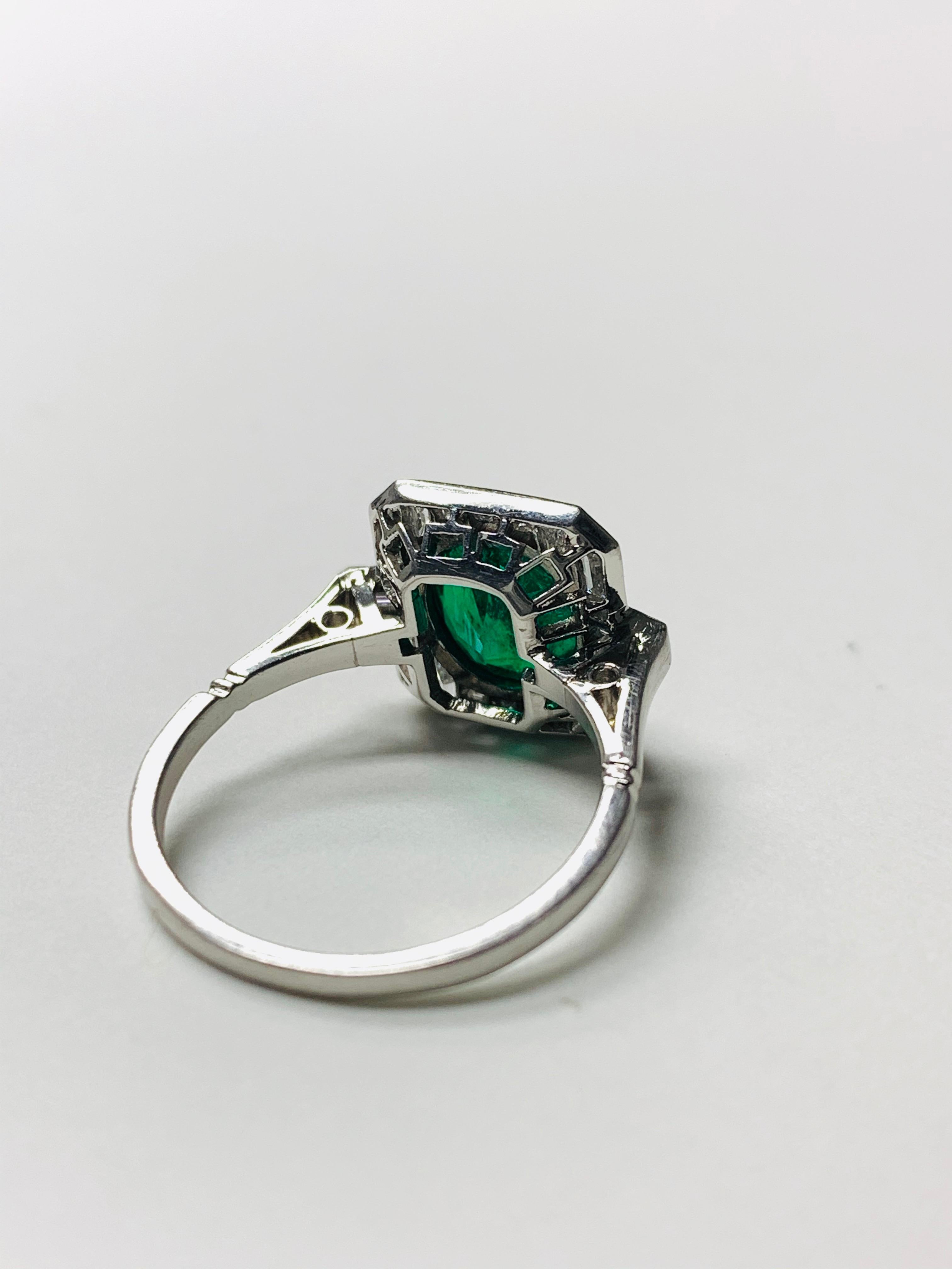 Women's Emerald and Baguette Diamond Engagement Ring in Platinum