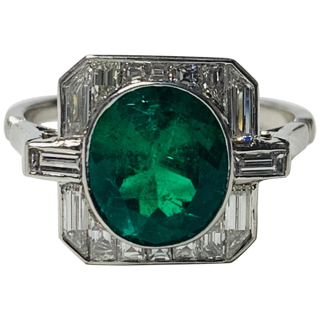 Emerald and Baguette Diamond Engagement Ring in Platinum