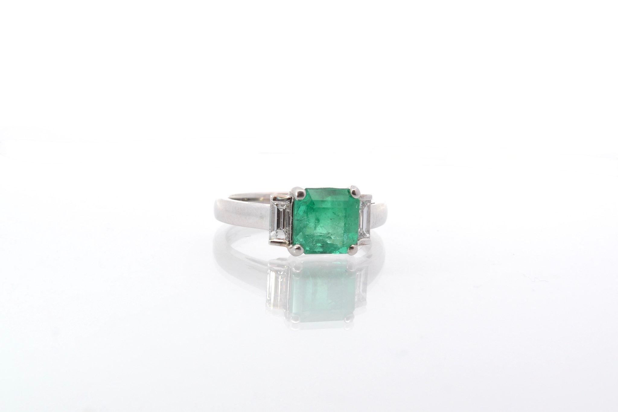 Emerald Cut Emerald and baguettes diamonds ring in 18k gold