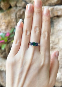 Emerald and Blue Sapphire Ring set in 18K White Gold Settings