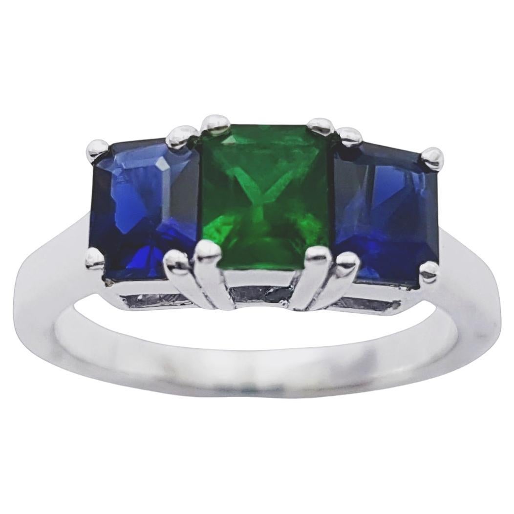 Emerald and Blue Sapphire Ring set in 18K White Gold Settings