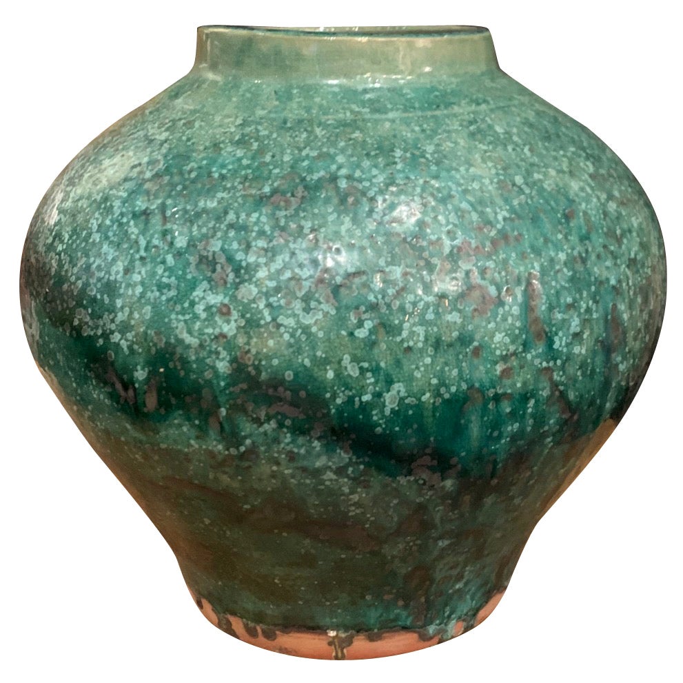 Contemporary Chinese emerald and deep turquoise vase.
Slightly textured glaze.
Classic ginger jar shape.
Several available.
