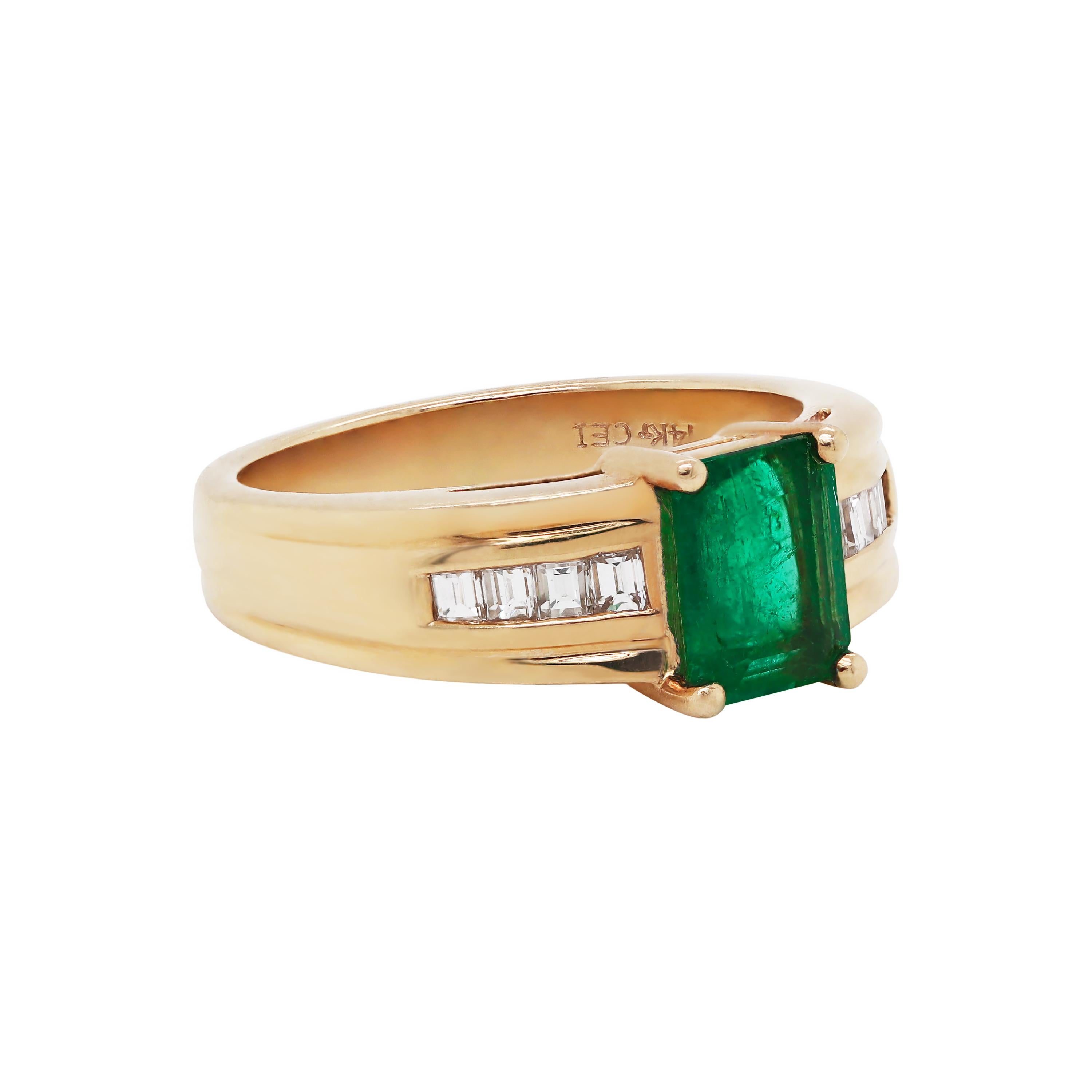 This beautiful ring features a vibrant emerald cut emerald weighing approximately 1.20ct mounted in an open back, four claw setting. To accompany the emerald, there are four channel set baguette cut diamonds on either side weighing an approximate