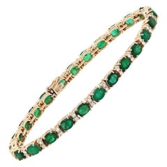 Smaragd und Diamant 14 Karat Gelbgold Tennisarmband