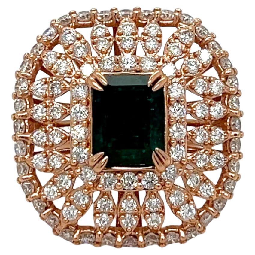 Anillo de oro rosa de 14k con esmeralda y diamantes