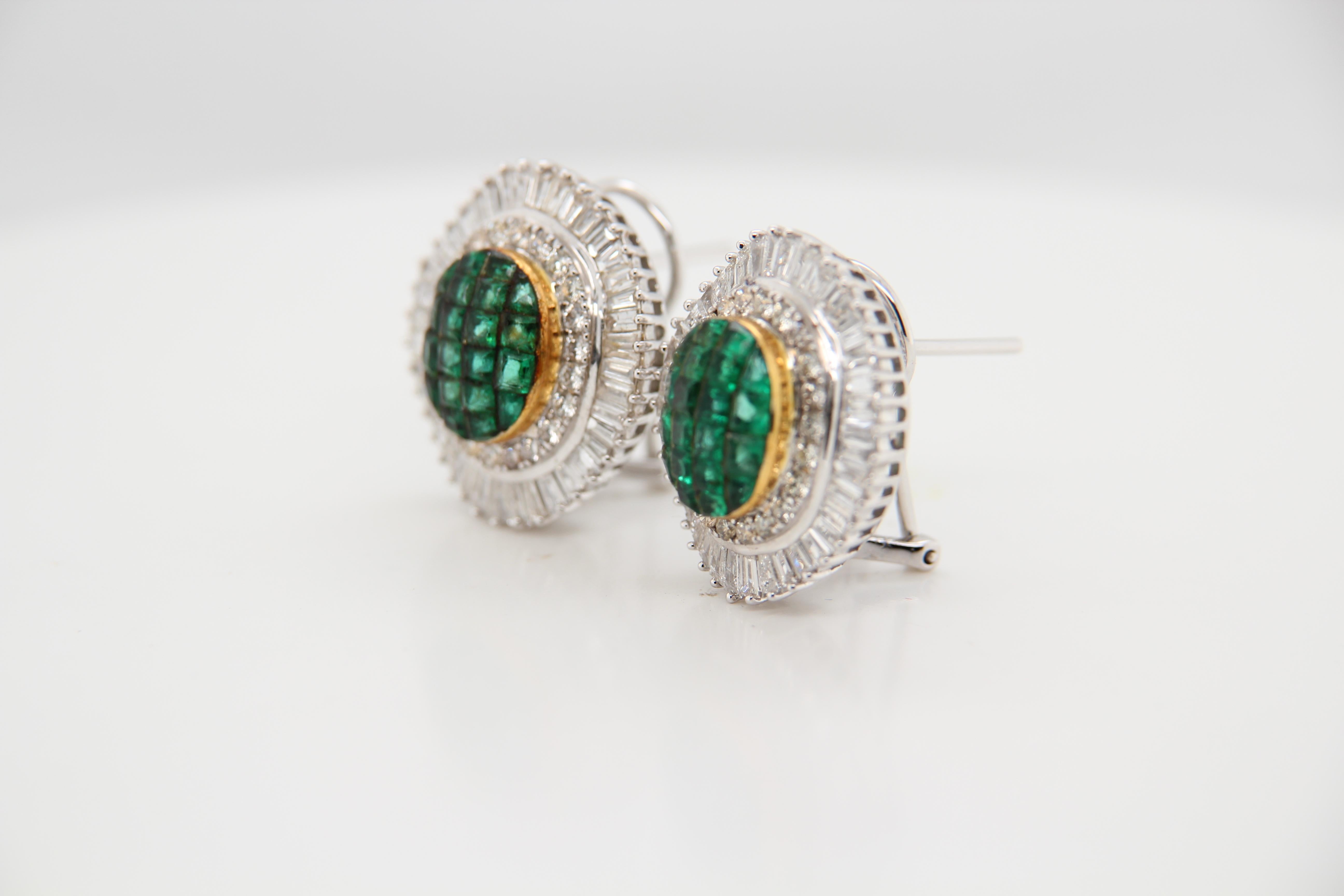 An emerald and diamond earring. The earring is studded with 7.00 carat emeralds and 3.65 carat diamonds. The earring is made in 18 karat white gold 15.56 g gross weight.