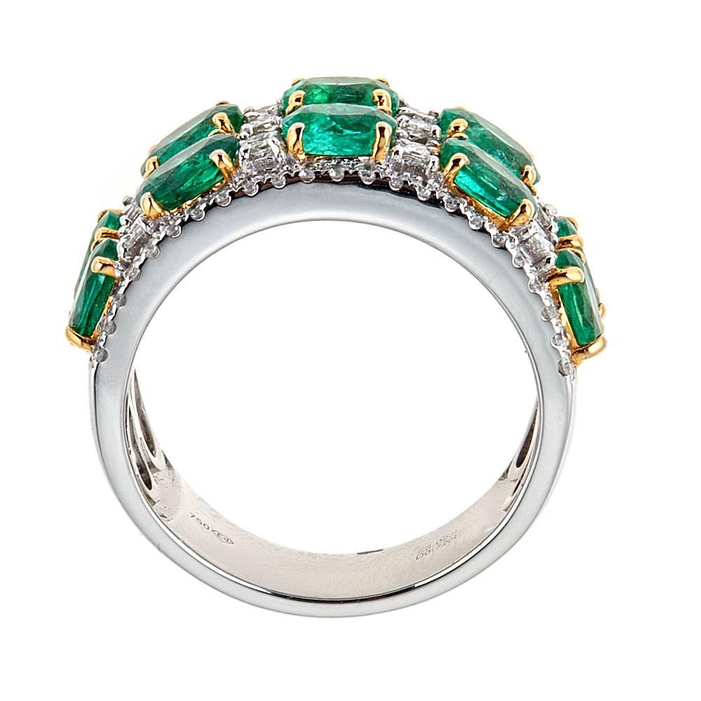 Casted in 18k white gold this elegant piece has approximately 3.09 CT in oval cut emeralds and .75 CT in diamonds
