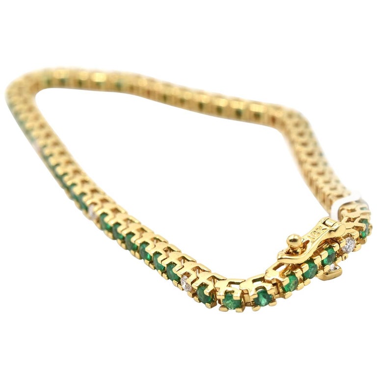 Emerald and Diamond 18 Karat Yellow Gold Tennis Bracelet at 1stDibs