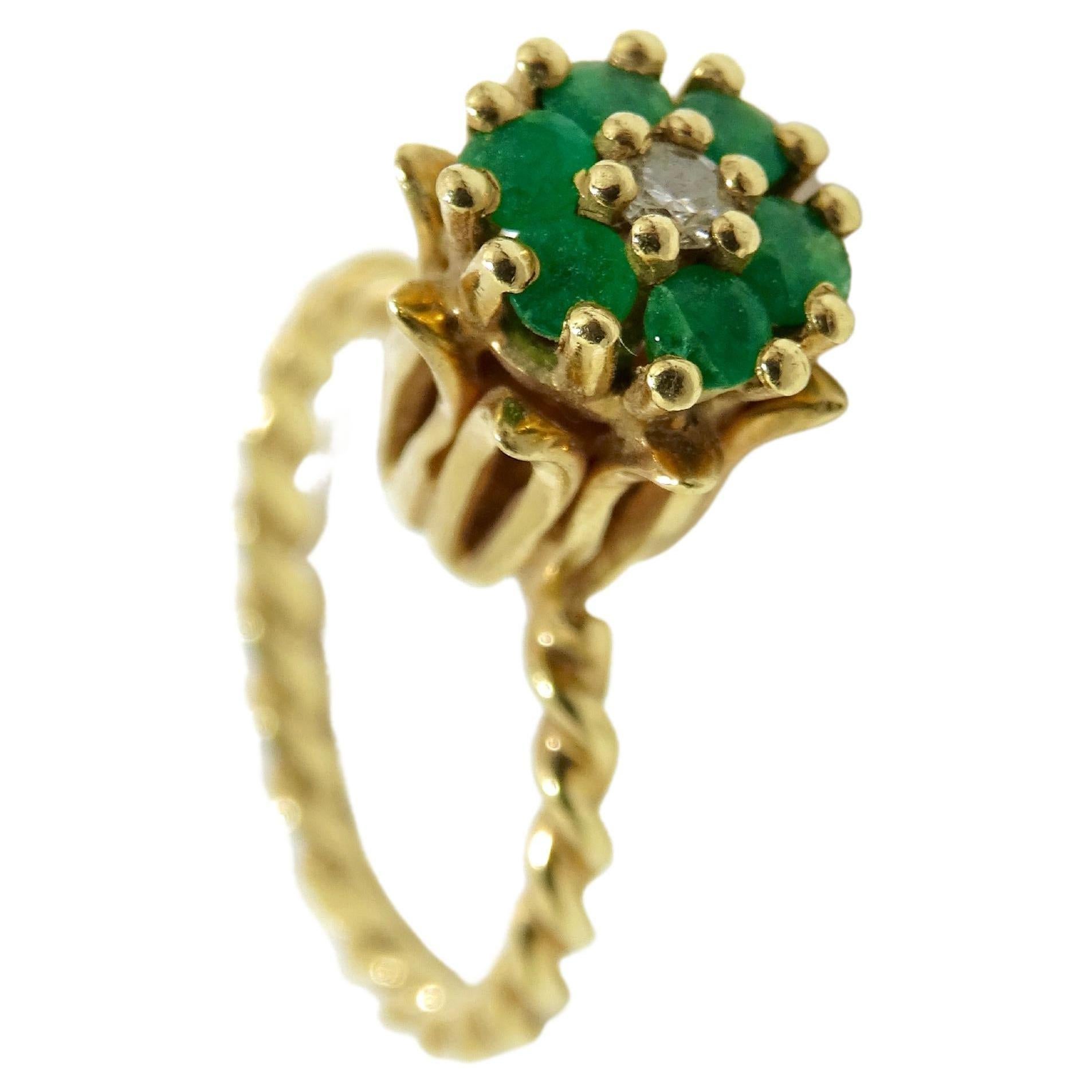 This Diamond and Emerald ring is a perfect layering piece to add to your collection. Green will add a pop of color to your other neutral rings. Don't miss the small details of this ring like the smart flower design. Pair this with a blouse from