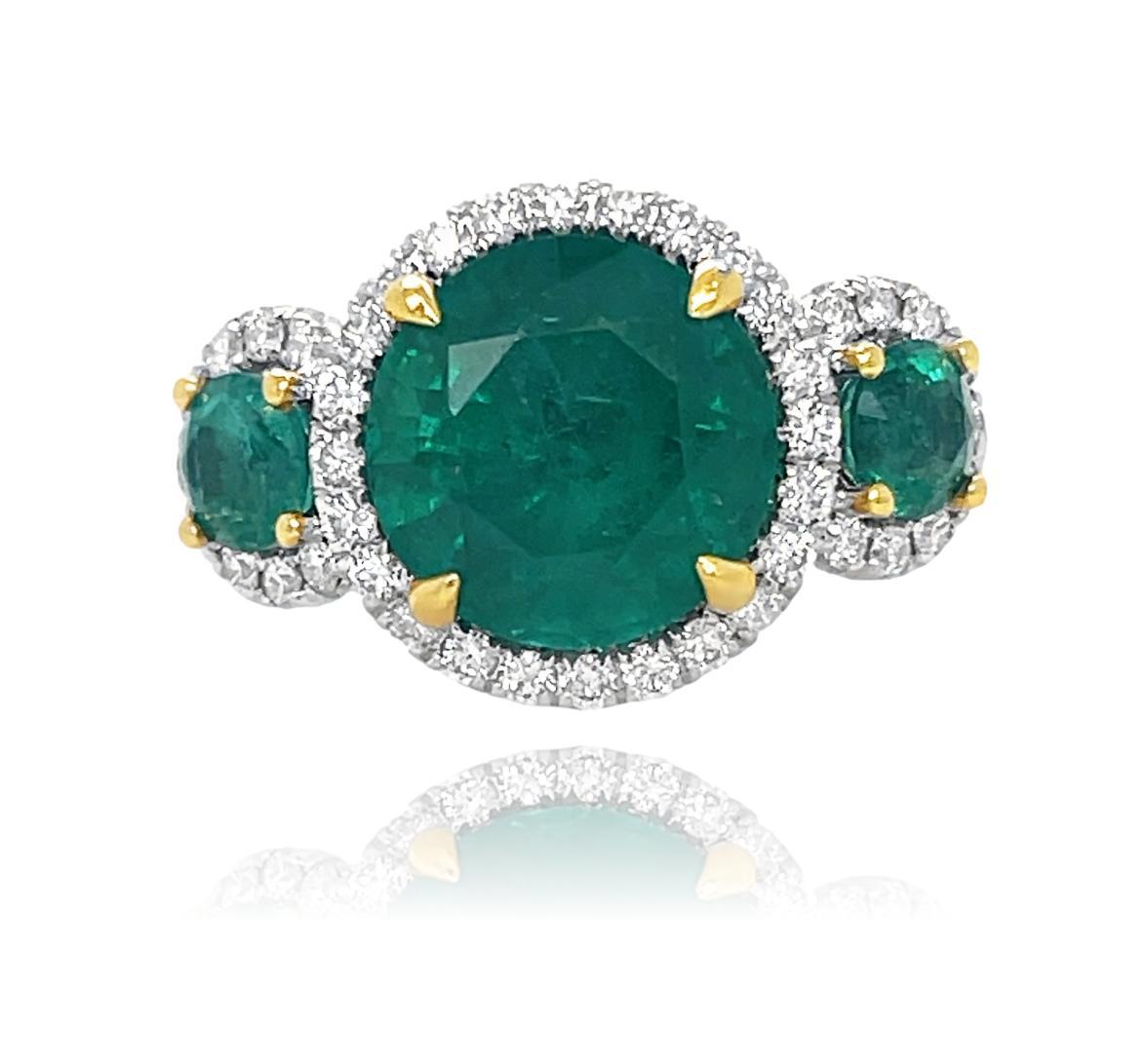 Women's Emerald and Diamond 3 stone halo Ring in 18K Yellow and White Gold  For Sale