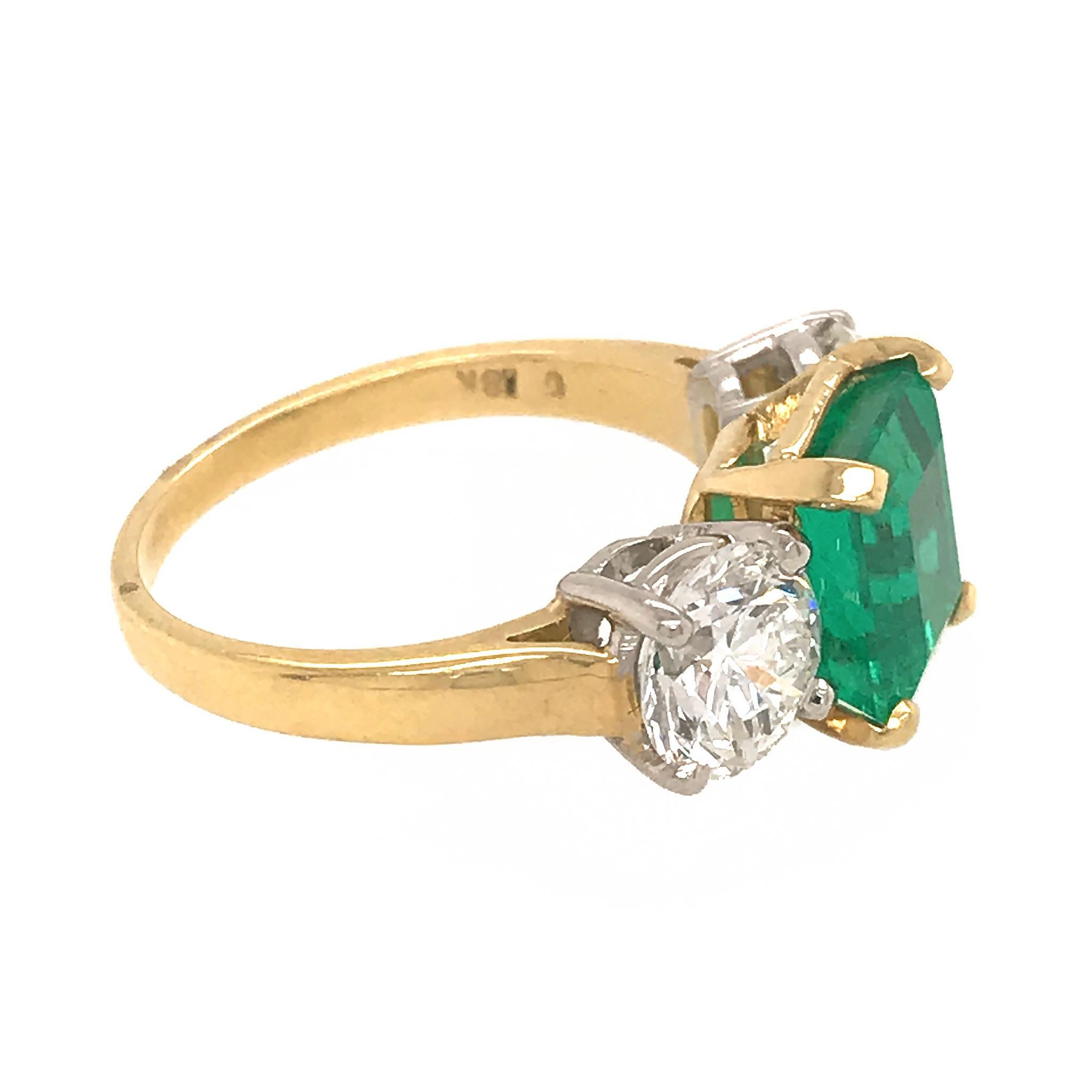 Round Cut Emerald and Diamond 3-Stone Ring