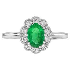 Emerald and Diamond Antique Style Halo Engagement Ring in 14K White Gold