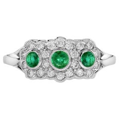 Emerald and Diamond Antique Style Three Stone Ring in 14K White Gold