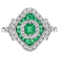 Anillo de compromiso de esmeralda y diamantes estilo Art Déco en oro blanco de 14 quilates