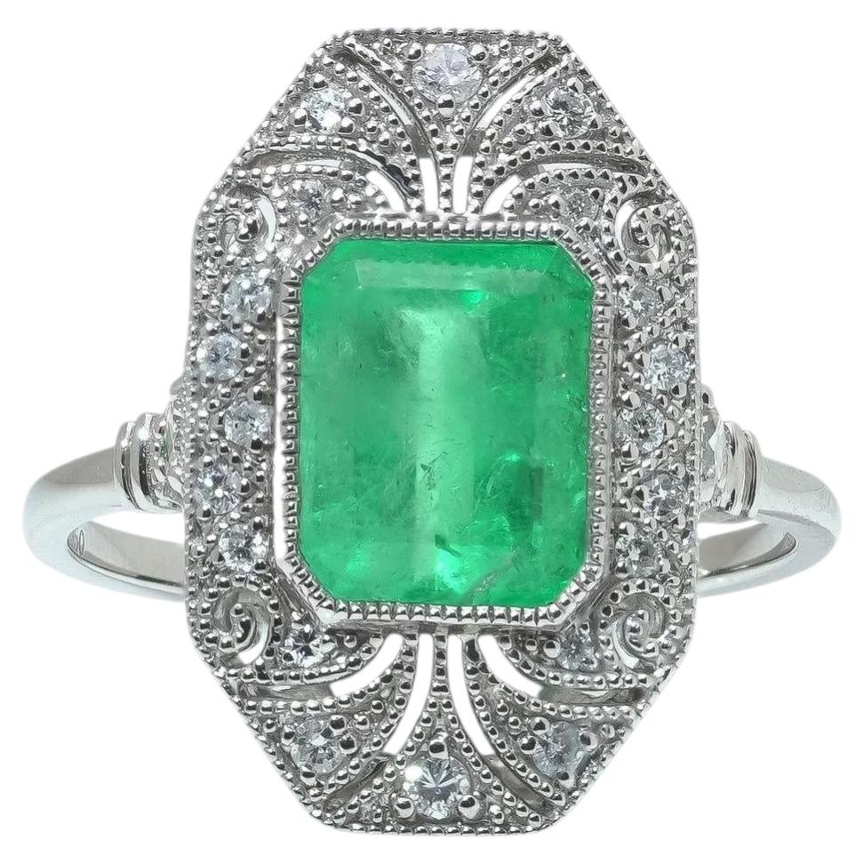 Anello in stile Art Déco con smeraldo e diamante in vendita