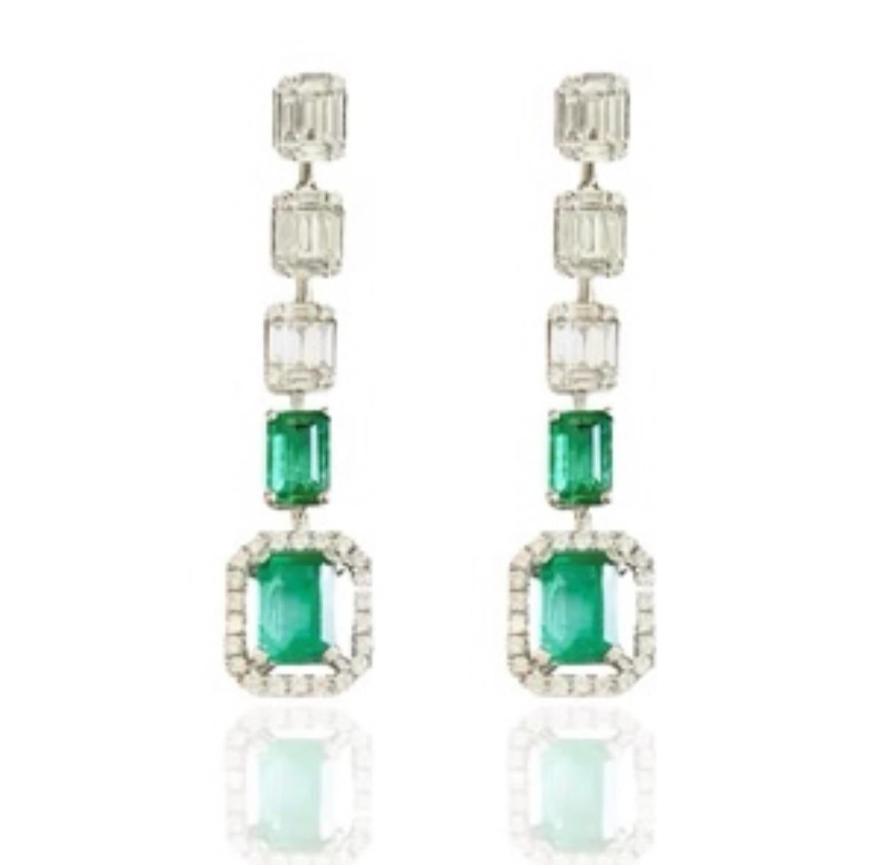 Emerald and Diamond Ava Earrings 
Emerald cut Diamond studs set in 18k White Gold with four Emerald cut drops, two in Diamond and two in Emerald. The last drop surrounded by brilliant round cut diamonds. 

These earrings make a timeless statement