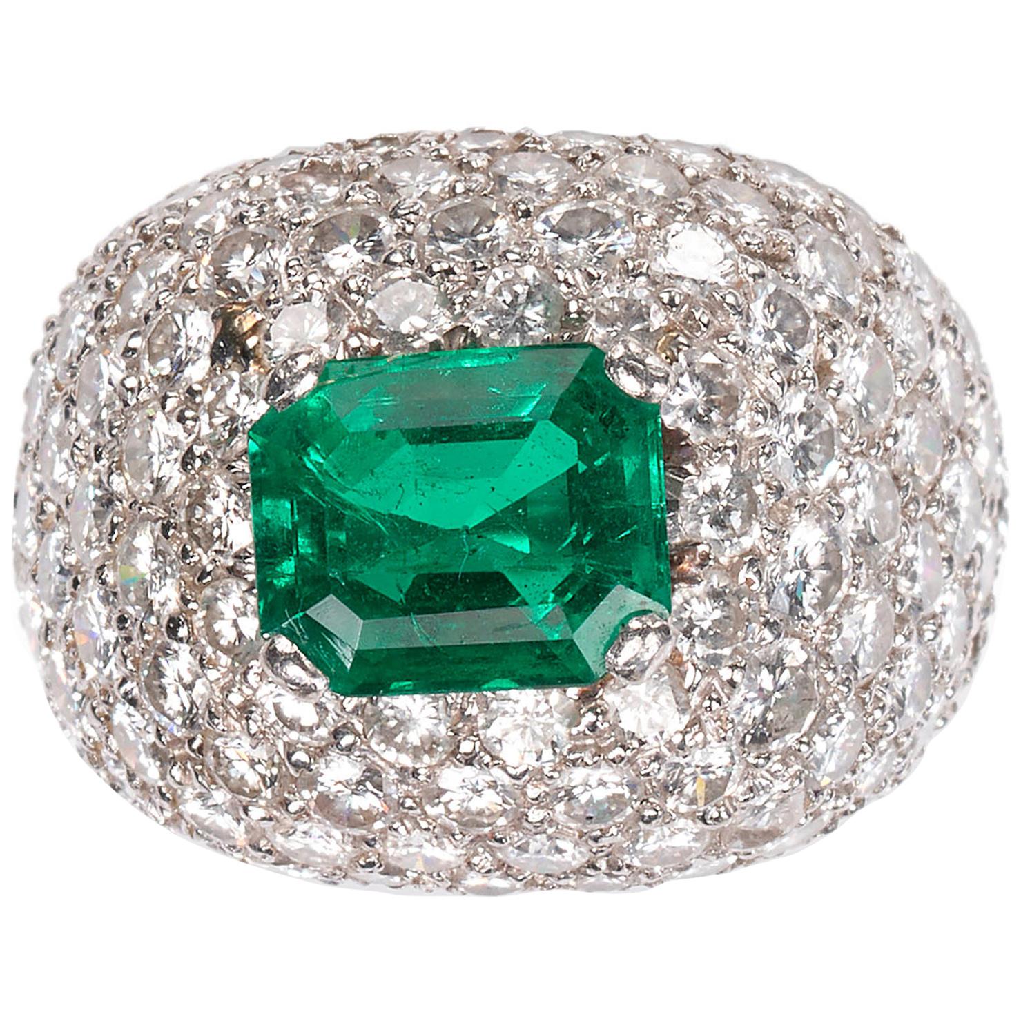 Emerald and Diamond Bombé Cluster 18 Karat White Gold Ring For Sale