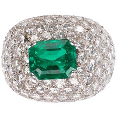 Emerald and Diamond Bombé Cluster 18 Karat White Gold Ring